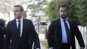 ©ETIENNE LAURENT/EPA/MAXPPP - epa06897887 (FILE) French President Emmanuel Macron (C) flanked by security staff Alexandre Benalla (R) leaves his home to cast his vote in the second round of the French legislative elections at the City Hall in Le Touquet, France, 18 June 2017 (reissued 19 July 2018). A video has been released on 19 July 2018 showing Alexandre Benalla, French President Emmanuel Macron's deputy chief of staff, wearing a riot helmet and police uniform, allegedly attacking protesters during street demonstrations on 01 May 2018. EPA-EFE/ETIENNE LAURENT